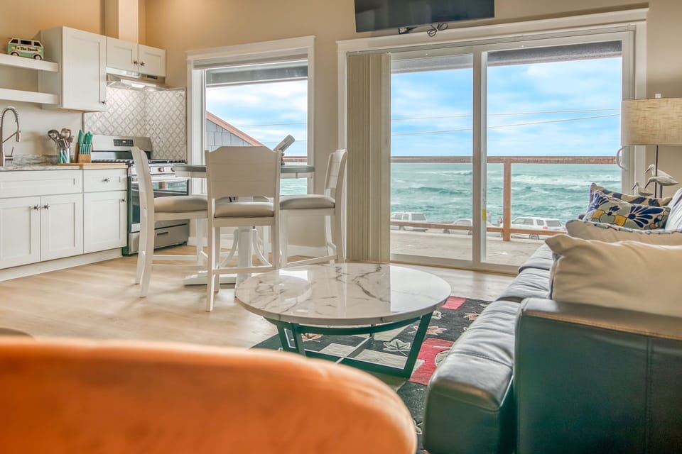 Relax in the living room and watch the waves.