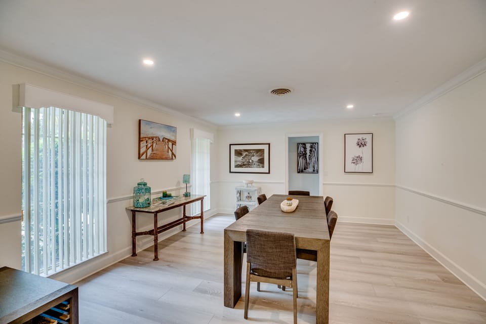 Pocket door keep master bedroom private from dining area.