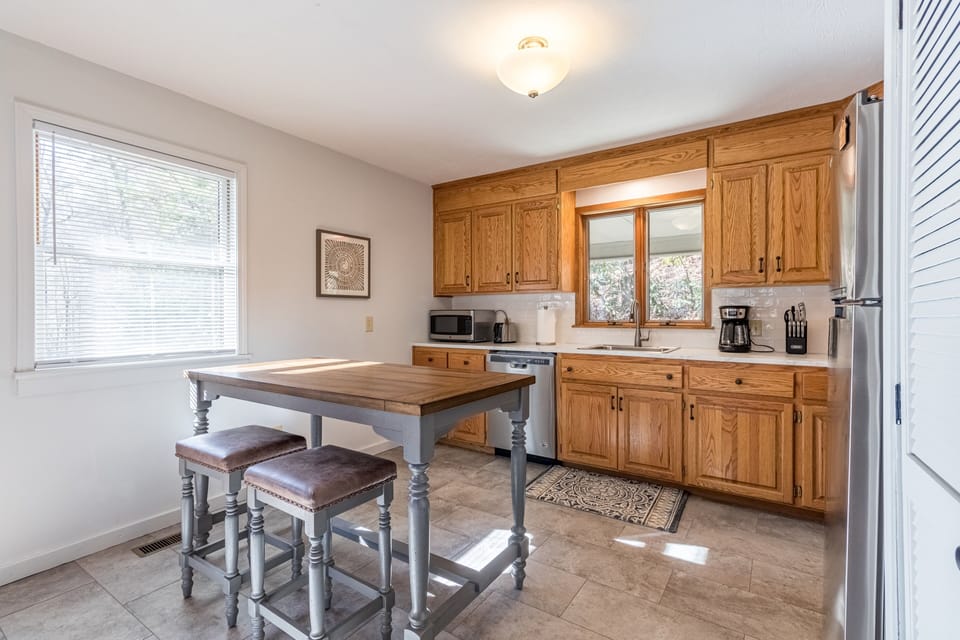 Extra seating is available at the kitchen island.