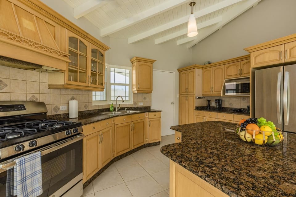 An elegant coffee/dining table will make your coffee time pleasurable while taking in the pool view.