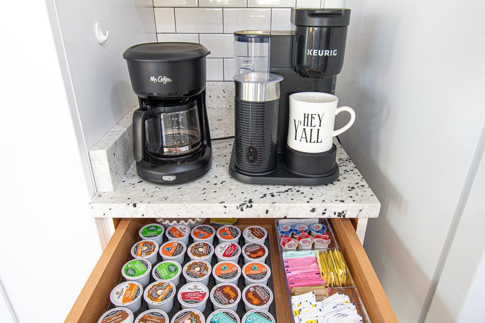 Treat yourself to a Cappuccino or Latte at the complimentary coffee bar