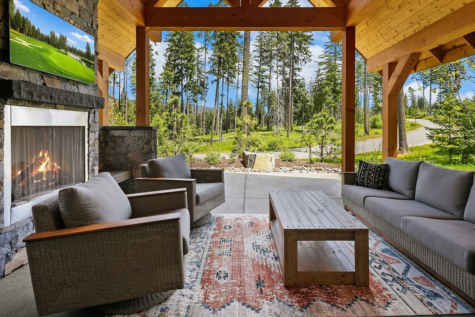 Sanctuary Villa: - Take in the mountain scenery as you unwind by the outdoor fireplace.