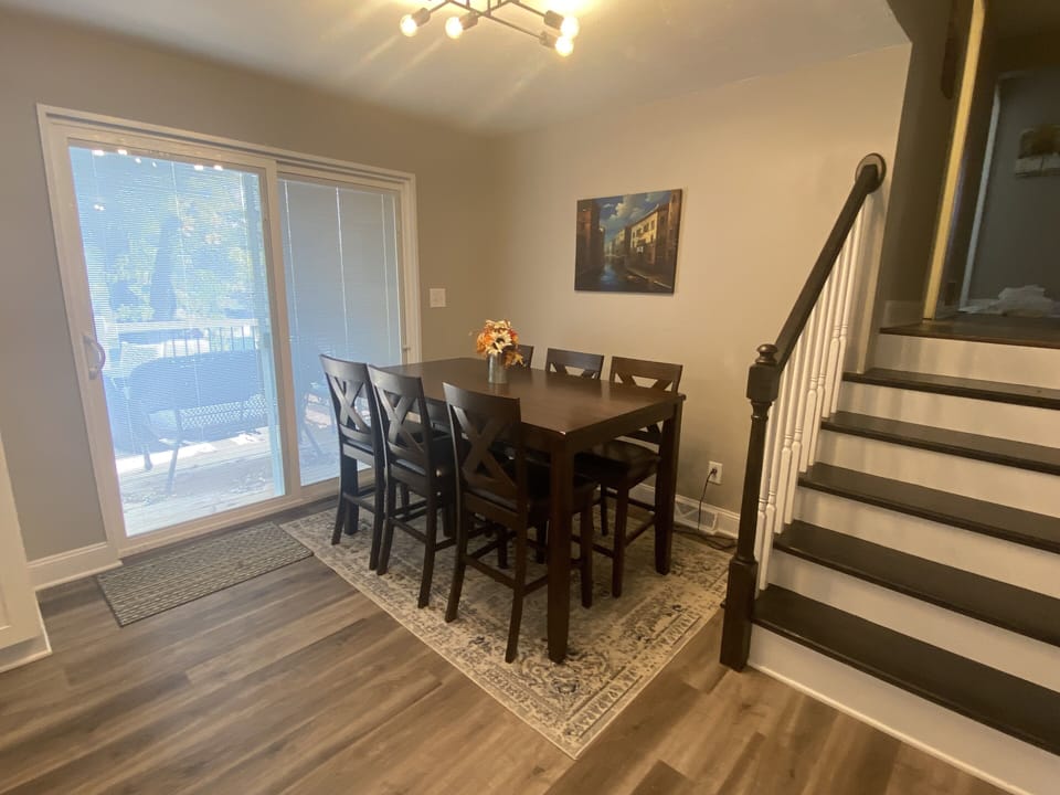 Dining area of great room with seating for 6 and access to deck