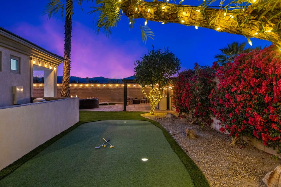 Head to the side of the yard for some putting green fun