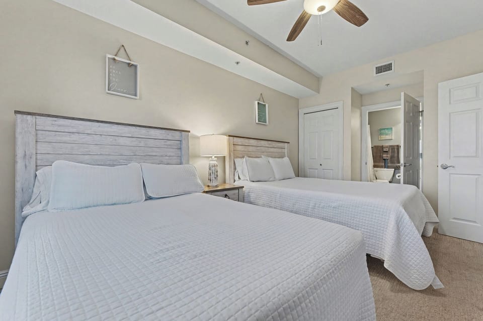 Third bedroom contains a queen bed, double bed and attached bathroom.