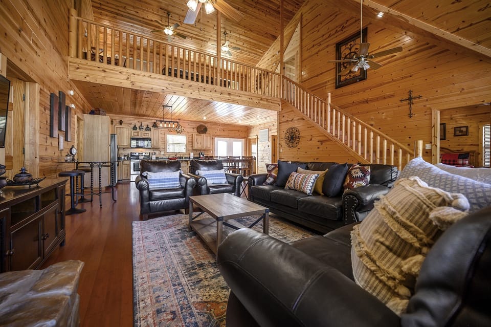 Family room with gas fireplace and plenty of seating for family and friends
