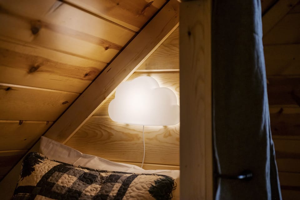 Kids wall light in built in twin bed