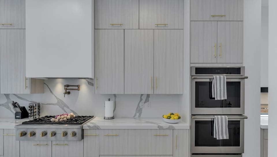 Open Fully Appointed Chef's Kitchen/ Bar Area with high-end appliances.