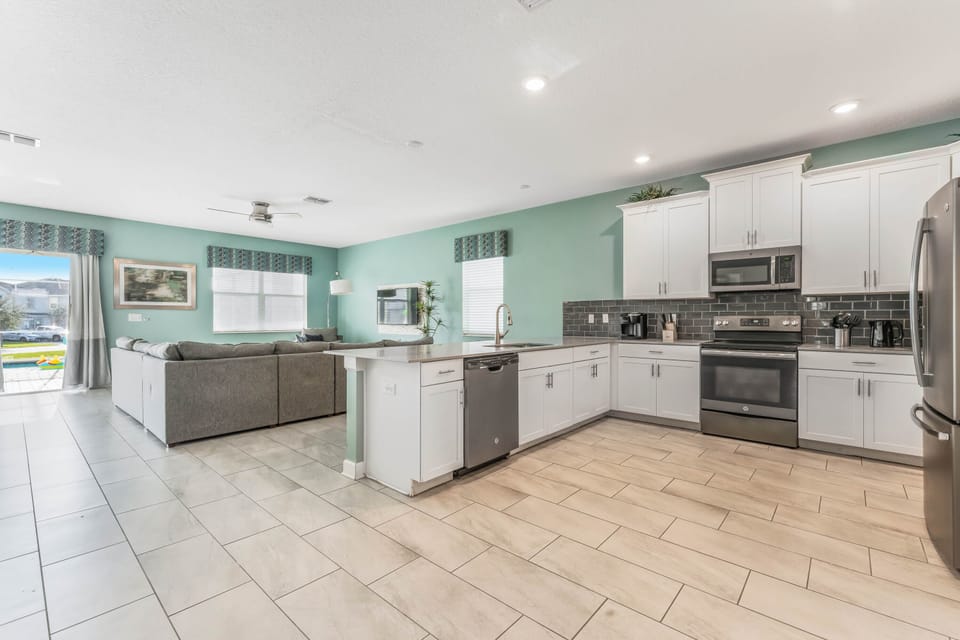 Beautiful fully equipped kitchen overlooking the living area. Keurig & Drip.