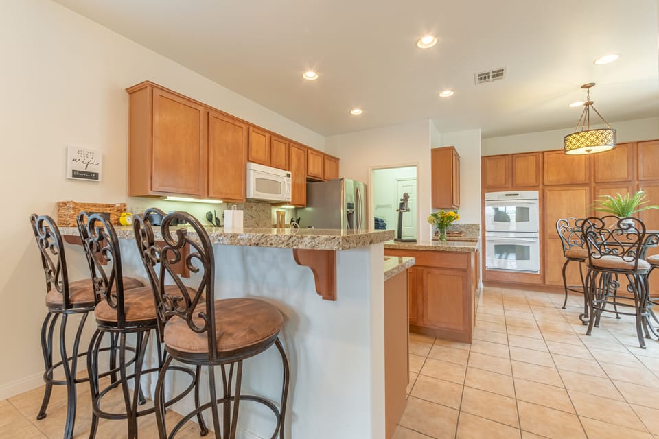 Kitchen with counter seating for 3