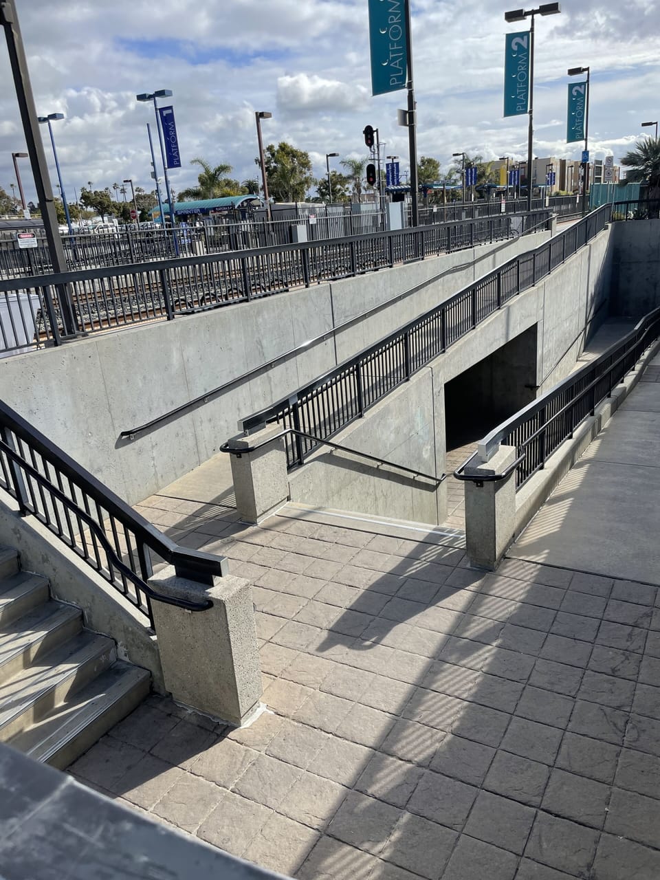  walkway takes you underneath the train tracks to station