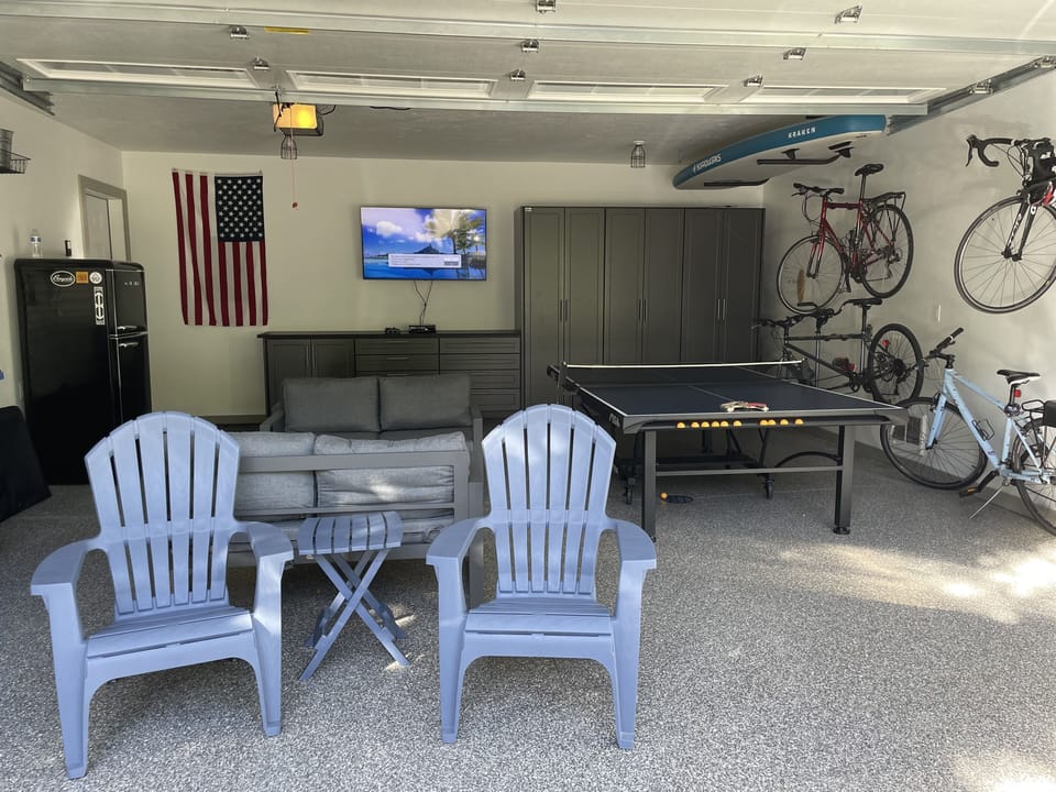 The game room awaits! Xbox, ping pong, paddle board, fishing poles, a tandem too