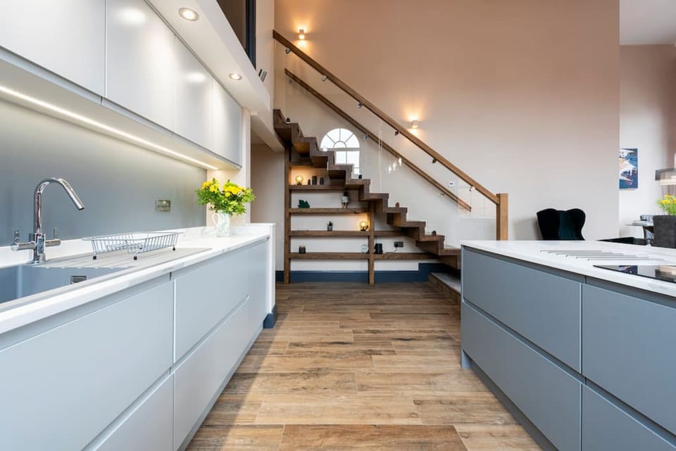 Luxuriously furnished self-catering apartment, modern kitchen complete with in-built appliances and hidden drawers. Each apartment has its own identical kitchen with everything you need.