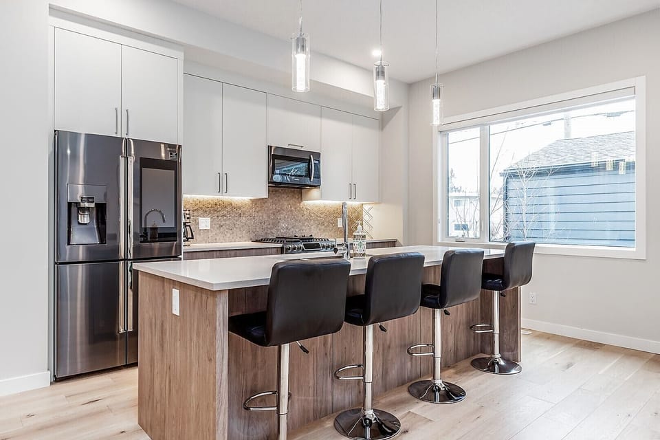 Fully Equipped Kitchen and the back entrance