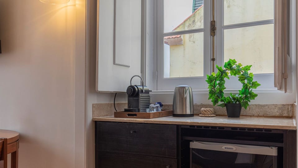 Very handy kitchenette with a dishwasher, microwave, mini fridge, coffee machine, stove and cooking utensils. #kitchen #cooking
