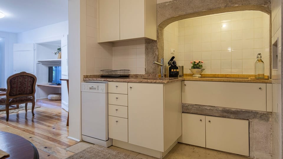 Very handy kitchenette with a dishwasher, microwave, fridge, coffee machine, stove and cooking utensils. #kitchen #cooking