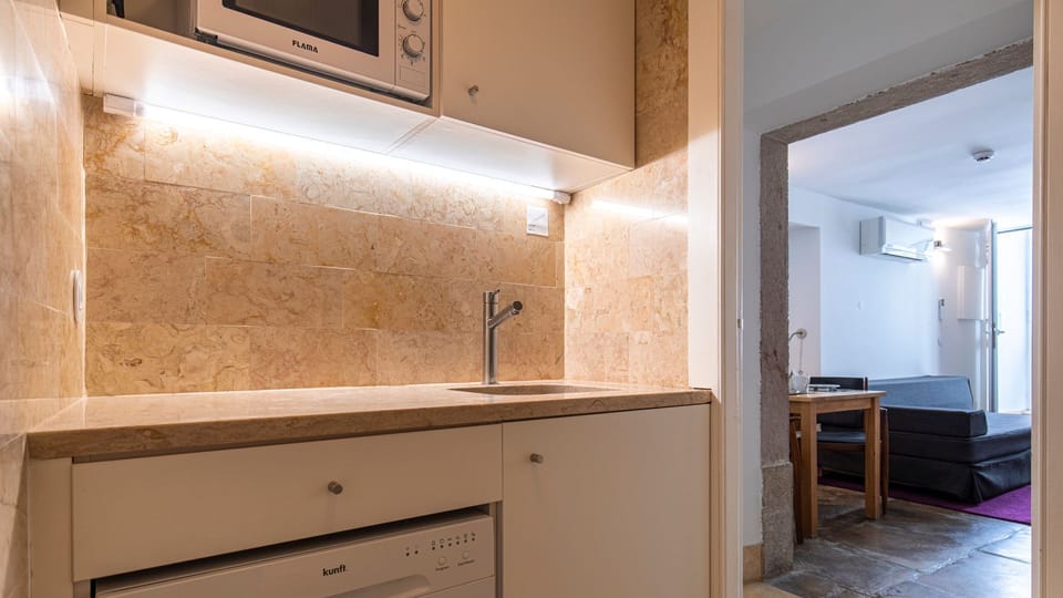 Very handy kitchenette with a dishwasher, microwave, mini fridge, coffee machine, stove and cooking utensils. #kitchen #cooking