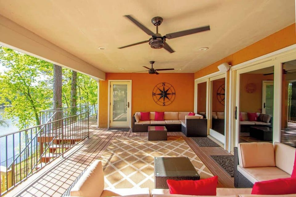 Stay cool under the fans while keeping an eye on the kids playing in the water.