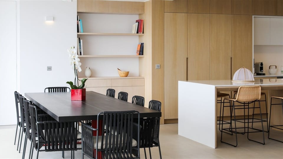 Dining Area: Indoor dining table for eight guests. Ocean view. 
