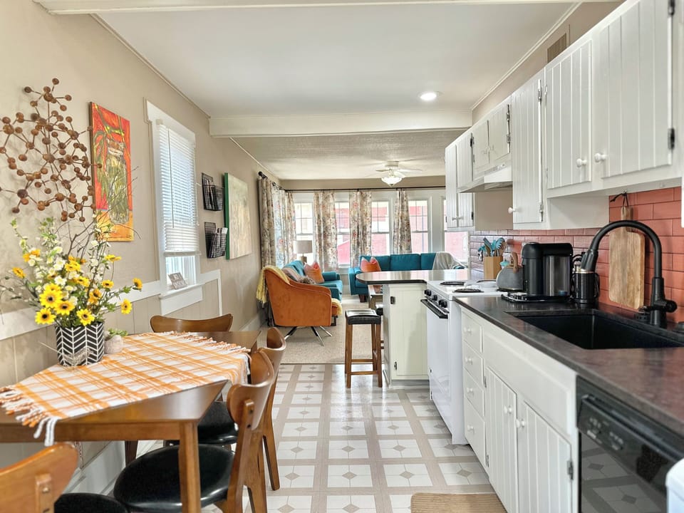 Kitchen and dining area open to living area. 