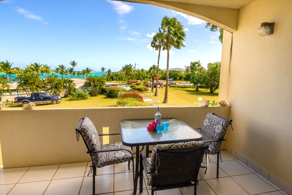 Enjoy your breakfast or a nice glass of wine on this balcony with a serene ocean view!