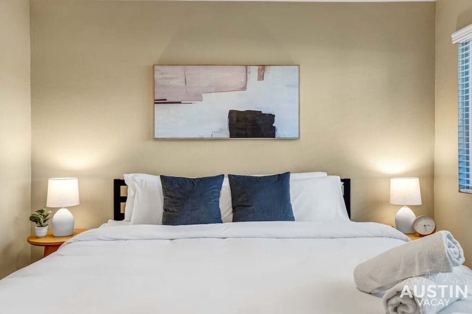 Spacious king bedroom with luxury hotel quality linens and closet