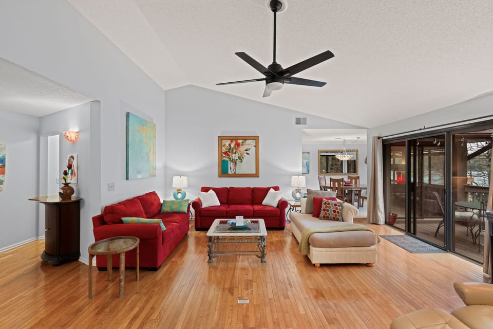 Living room: open concept, huge, seating for everyone, wet bar, fireplace.