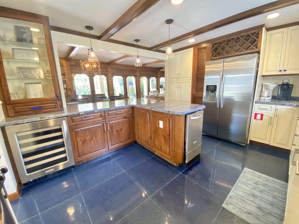 Open floor plan. The kitchen, dining room and family room. Wine refrigerator 