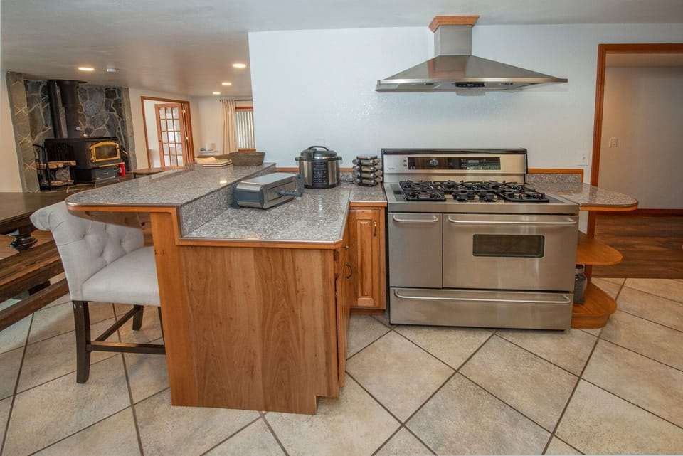 Large Kenmore Prestige double oven with 6 burners.  Pots/pans/bakeware provided