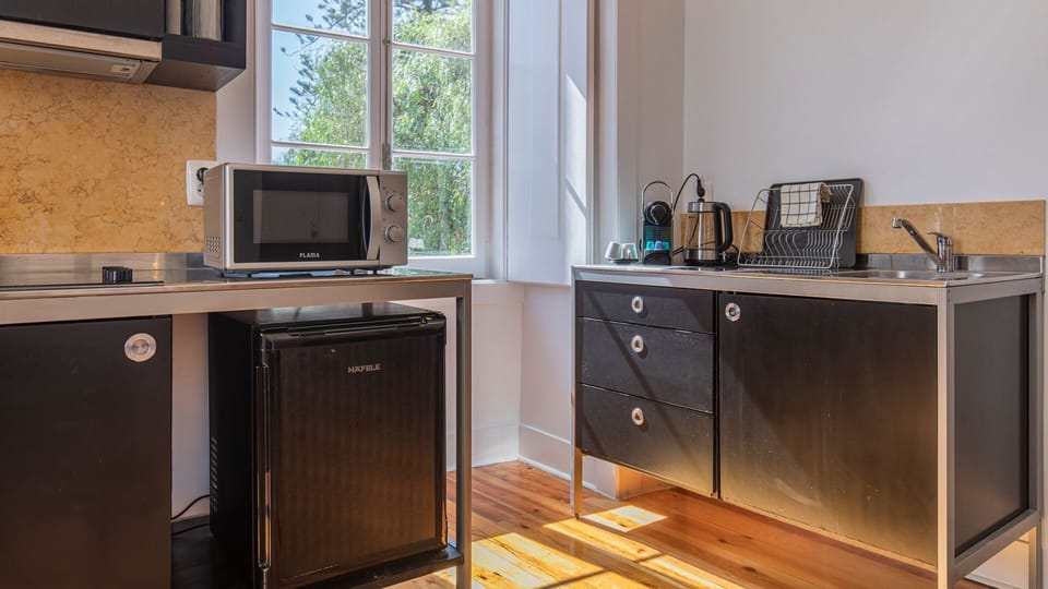 Very handy kitchenette with a microwave, mini fridge, coffee machine, stove and cooking utensils. #kitchen #cooking