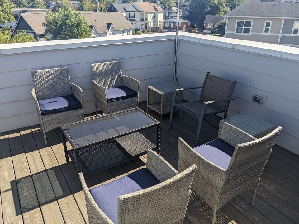 The rooftop deck offers plenty of seating for the whole group.