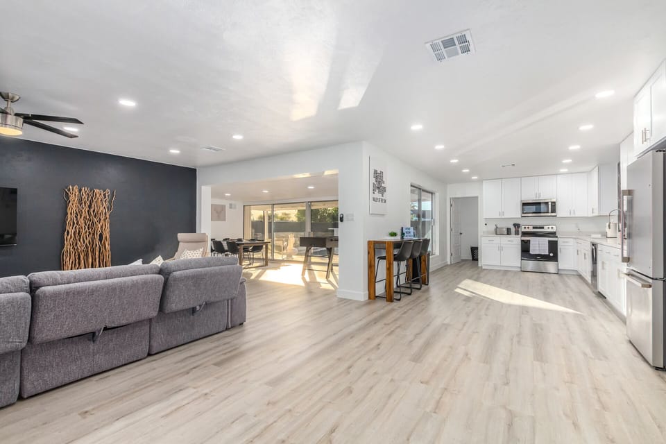 Open floor plan living room/kitchen/dining room
