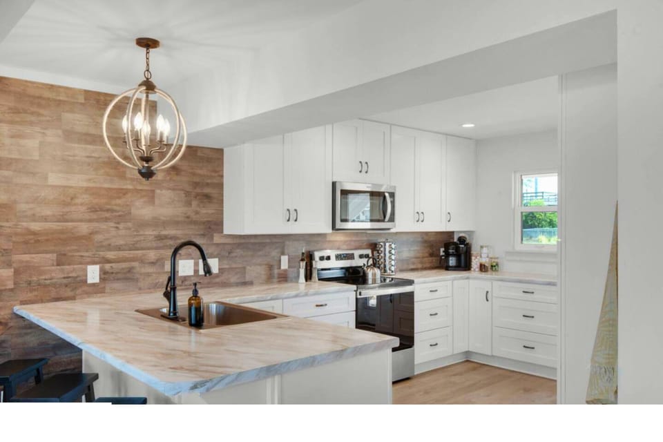Cook and gather in this beautifully appointed kitchen