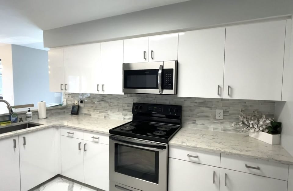 updated kitchen with stainless steal appliances 