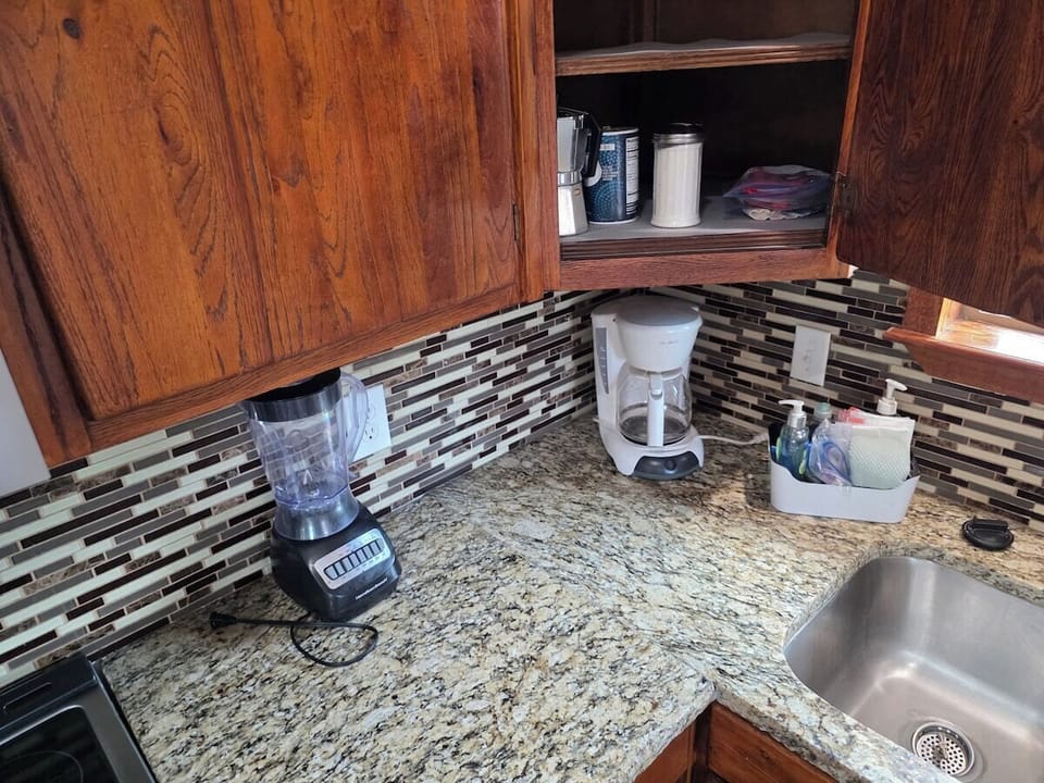 Granite counters, stainless appliances, and views from the sink.