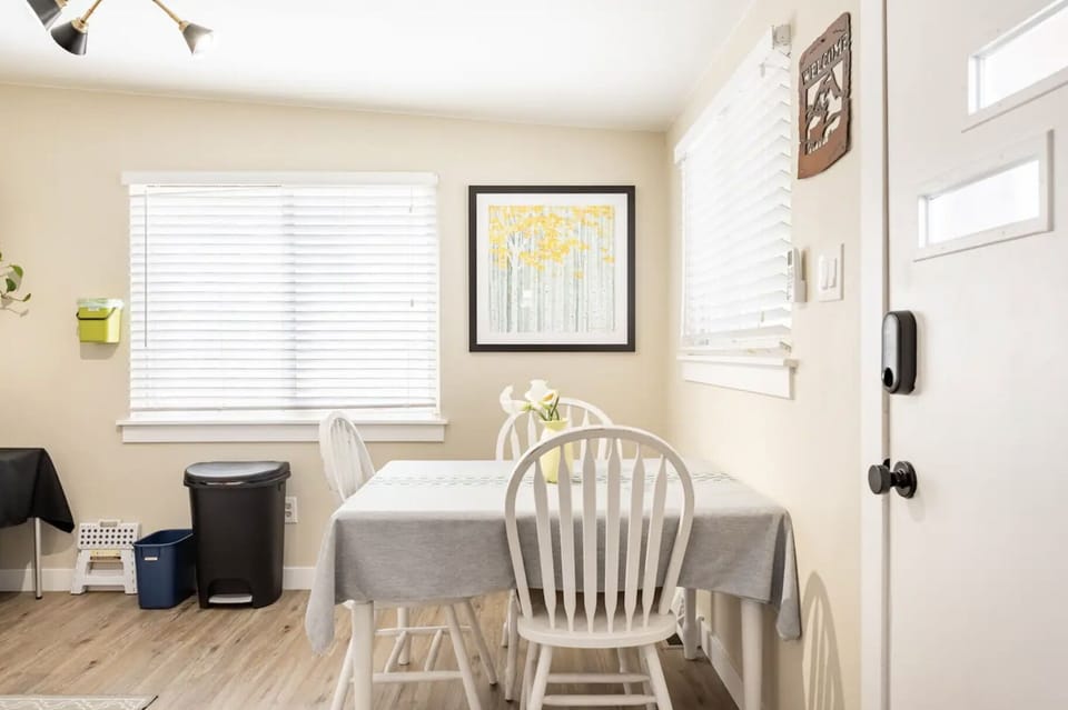 Kitchen table ready for dinner or a remote work space!