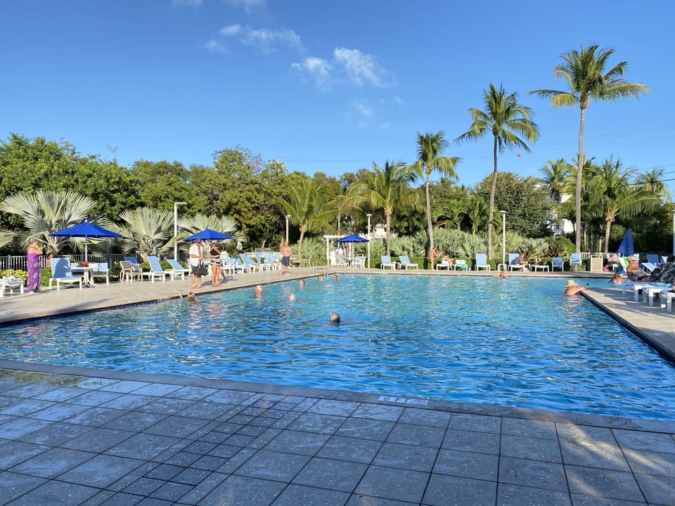 Junior Olympic resort pool with pool bar and hot tub