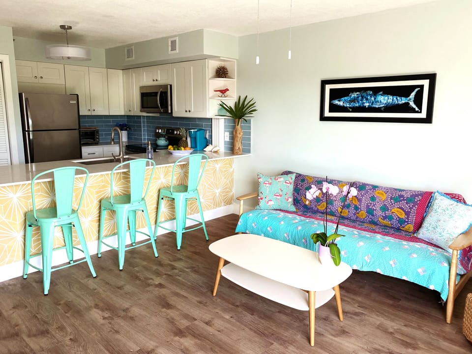 Living Room with open kitchen and bar