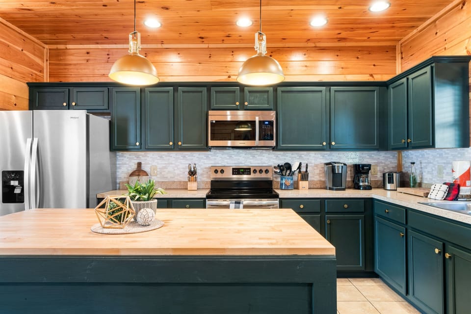 Fully equipped kitchen ready for your group to gather and enjoy time together over meals.