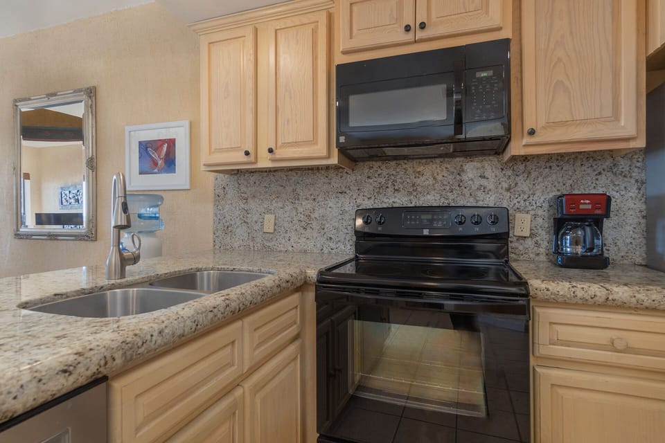 Appliances in the kitchen are perfect for your stay.