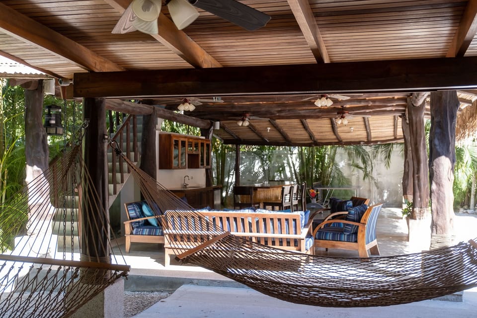Not one, but TWO hammocks on the porch!  That’s the Rancho in the background. 