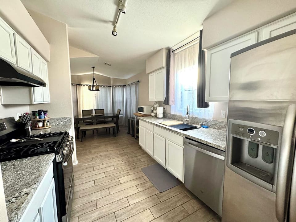 Fully stocked kitchen with gas stove