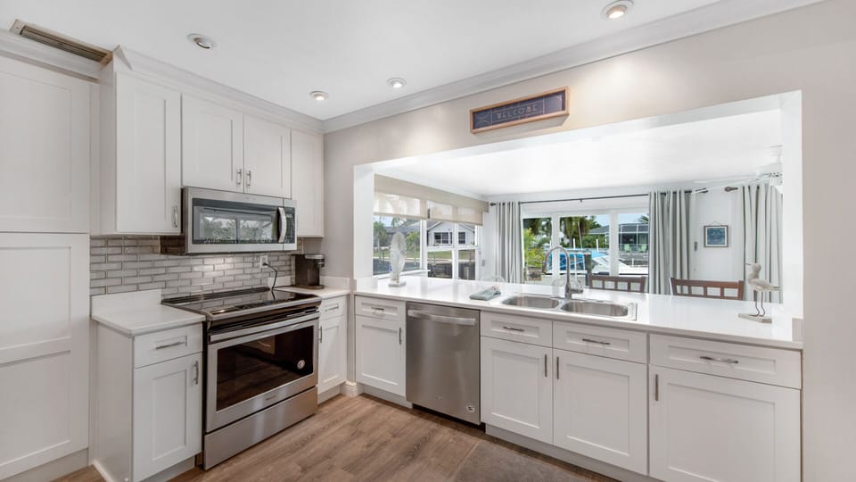 Kitchen looking out into the pool area