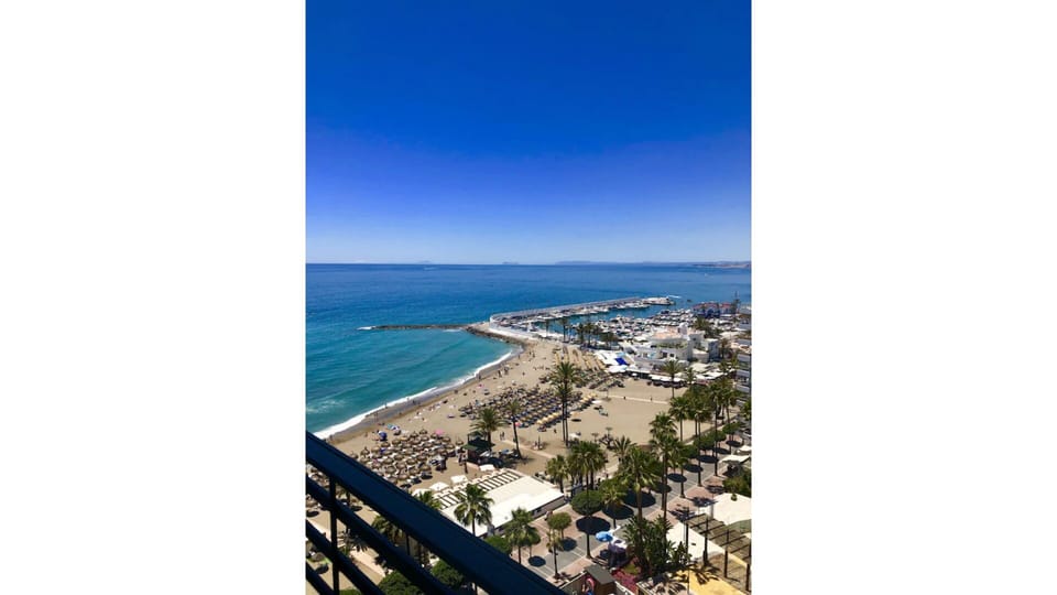The view from your terrace at 11th floor, towards the harbour and beach