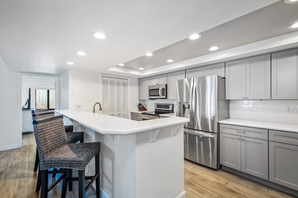 Extra seating at the kitchen counter with 3 bonus bar stools—perfect for quick breakfasts or casual conversation while cooking