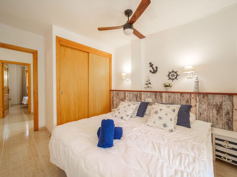 Furniture, Property, Comfort, Azure, Building, Wood, Ceiling Fan, Door, Interior Design, Floor