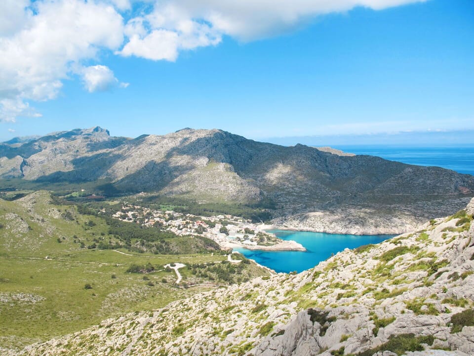 Water, Sky, Daytime, Azure, Building, Coastal And Oceanic Landforms, Body Of Water, Landscape, Beach, Natural Landscape