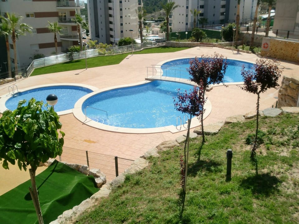 Water, Plant, Property, Building, Swimming Pool, Tree, Urban Design, Grass, Shade, Residential Area
