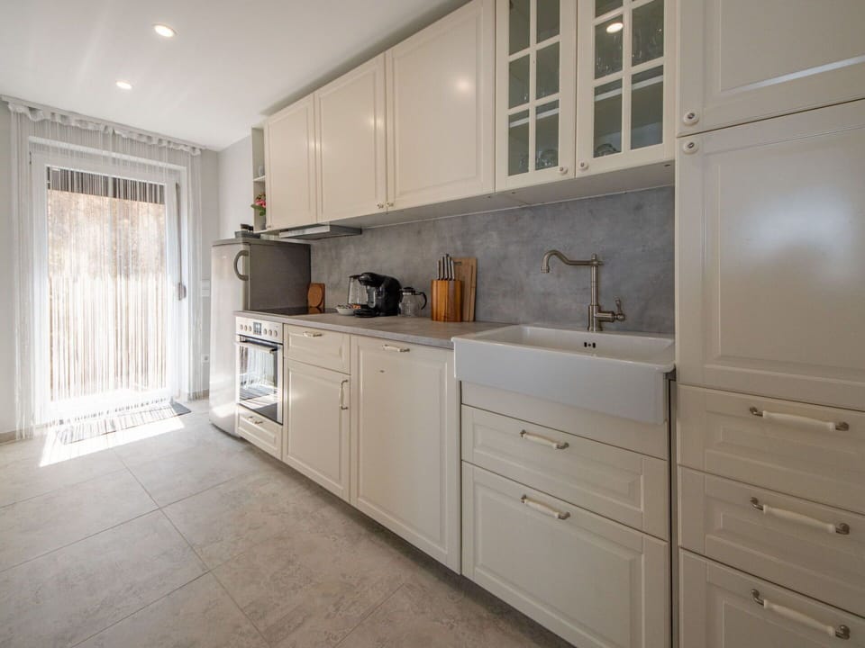 Cabinetry, Countertop, Furniture, Building, Drawer, Kitchen, Sink, Chair, Wood