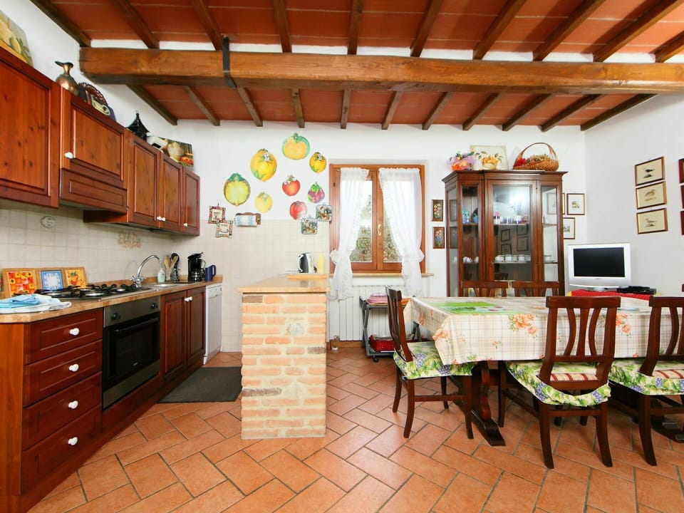 Furniture, Cabinetry, Table, Building, Countertop, Wood, Picture Frame, Interior Design, Chair, Drawer